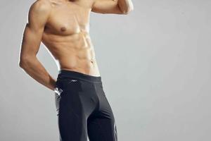 manlig kroppsbyggare uppblåst torso atletisk enhetlig Gym foto