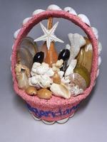 souvenirer från pangandaran väst strand tillverkad av skal och sjöstjärna. foto