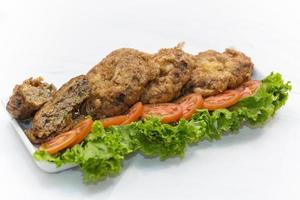 nawabi mat, fårkött tikka kebab. detta typer av mat är för smakrika och utsökt. foto