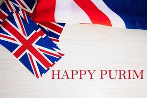 Lycklig purim. brittiskt högtider begrepp. Semester i förenad rike. bra storbritannien flagga bakgrund. foto