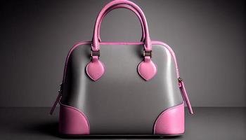 skön trendig slät ungdom kvinnors handväska i ljus rosa Färg på en grå studio bakgrund. generera ai. foto