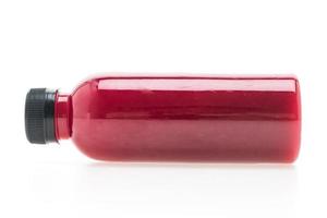 rödbetor juice flaska isolerad på vit bakgrund foto
