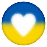 runda knapp med lysande hjärta på målad ukrainska flagga foto