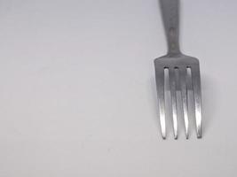 en stänga upp av gaffel med vit bakgrund foto