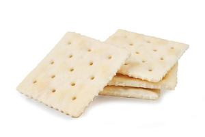 fyrkant crackers isolerat på vit bakgrund med klippning väg foto