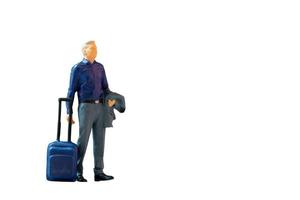 miniatyr människor affärsman med bagage på vit bakgrund foto