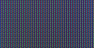 abstrakt bakgrundsmönster av färgade suddiga prickar på en mörk bakgrund på nära håll foto