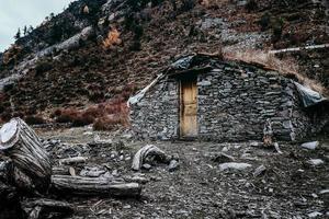 sten hus av alpina herdar i tibetan områden av Kina foto