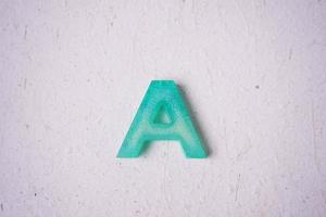 alfabet nyckel kedja tillverkad från harts foto