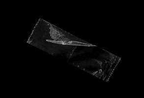 lim plast tejp isolerat på svart bakgrund foto