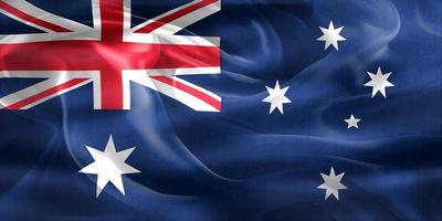 australiens flagga - realistiskt viftande tygflagga foto