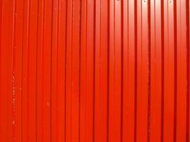 industriell stil rött korrugerat stål foto