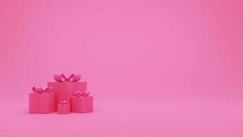 rosa gåva låda med band på rosa bakgrund foto