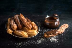 choklad dopp och churros foto