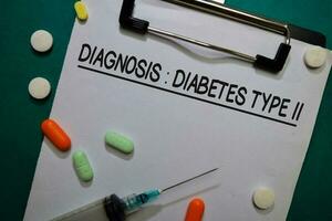 diagnos - diabetes typ ii skriva på en pappersarbete. sjukvård eller medicinsk begrepp foto