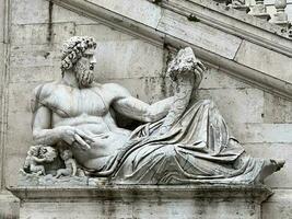 staty av tiberinus på de campidoglio i rom, Italien foto