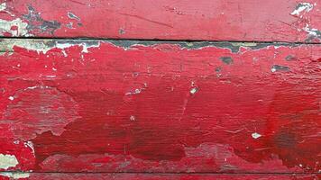röd målad trä textur med peeling måla foto