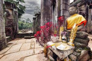 Buddha staty vid Angkor tempel i Siem Reap, Kambodja foto