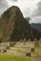 ruinerna av den förlorade inkastaden Machu Picchu och Wayna Picchu nära Cusco i Peru foto