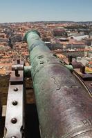 detalj av kanon som pekar på Lissabon Portugal foto