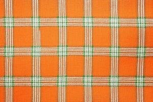 orange tyg textil- mönster, pläd bakgrund, Linné bomull. ai generativ foto