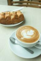 varm latte kaffe konst foto