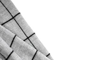 ovanifrån av skrynkligt texturerat grått tyg på en vit bakgrund med ett område för text foto