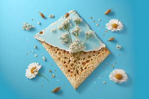 matzah och vår blommor på blå bakgrund, perfekt för pesah firande begrepp. generativ ai foto