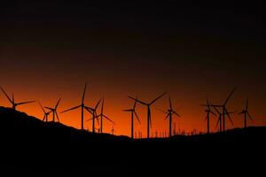 solnedgång i coachella dal vind turbiner kraft växt foto
