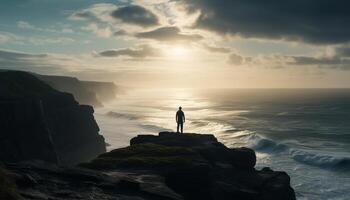 ett man stående på klippa, tillbaka belyst förbi solnedgång silhuett genererad förbi ai foto