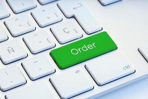 beställ ord på grönt tangentbord online köp och shopping koncept
