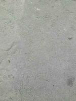 gammal betong textur bakgrund, grov cement textur, smutsig cement golv foto