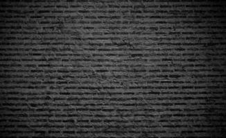 svart tegelvägg textur bakgrund foto