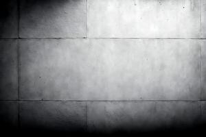 en minimalistisk grå betong texturerad vägg bakgrund. foto
