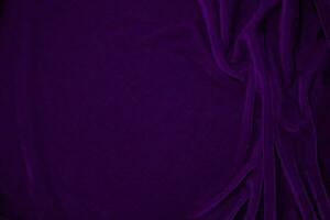 lila sammet tyg textur Begagnade som bakgrund. violett Färg panne tyg bakgrund av mjuk och slät textil- material. krossad sammet .lyx magenta tona för silke. foto