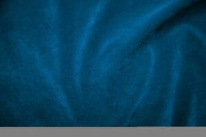 blå sammet tyg textur Begagnade som bakgrund. blå tyg bakgrund av mjuk och slät textil- material. där är Plats för text. foto