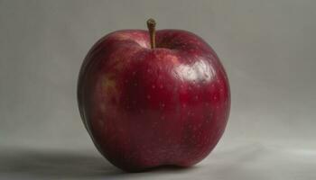 saftig röd utsökt äpple, en symbol av friska äter och friskhet genererad förbi ai foto