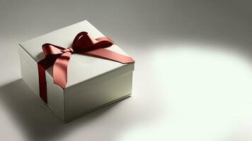 3d framställa av grå gåva låda med röd silke rosett band och kopia Plats. foto