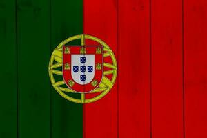 flagga av portugisiska republik på en texturerad bakgrund. begrepp collage. foto