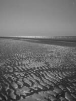 de strand av de haan i belgien foto