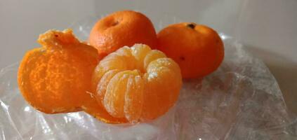 fotografi av en knippa av santang apelsiner foto