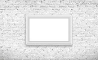 vit ram hängande på en tegel vägg foto