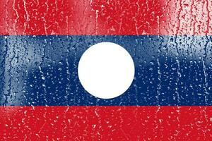3d flagga av laos på en glas foto