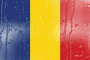 3d flagga av rumänien på en glas med vatten släppa bakgrund. foto