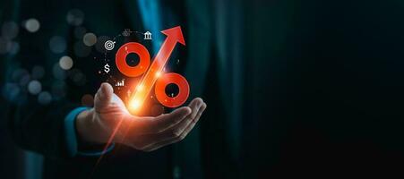 företag utlåning och investering intressera priser, hand håll öka procent ikon, skuld öka, intressera börda, intressera Betygsätta stiga, utdelningar, finansiell företag strategi, vinst från stock, investerare foto