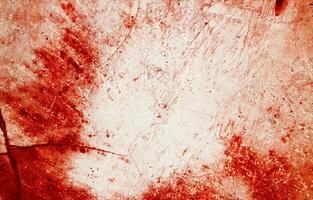 stänker av röd måla likna färsk blod, deras ojämn kanter bidrar till en känsla av oro. de fläckar, påminner av halloween fasor. foto