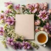 sommar inbjudan kort med äng blommor och kopp av te på rosa bakgrund. platt lägga, ai genererad foto