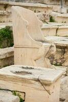 detalj av de sittplatser på de teater av dionysus eleuthereus de större teater i aten daterad till de 6:e århundrade före Kristus foto