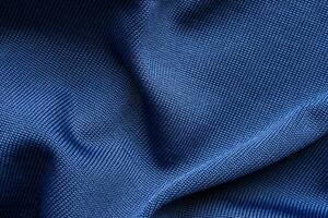 blå sporter Kläder tyg fotboll skjorta jersey textur foto