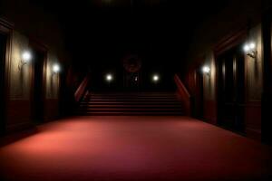 en vagt belyst hall med röd matta och trappa. ai genererad foto